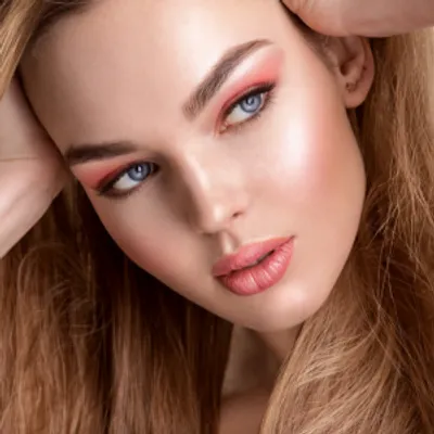 A women, head shot, full face of Avon Makeup